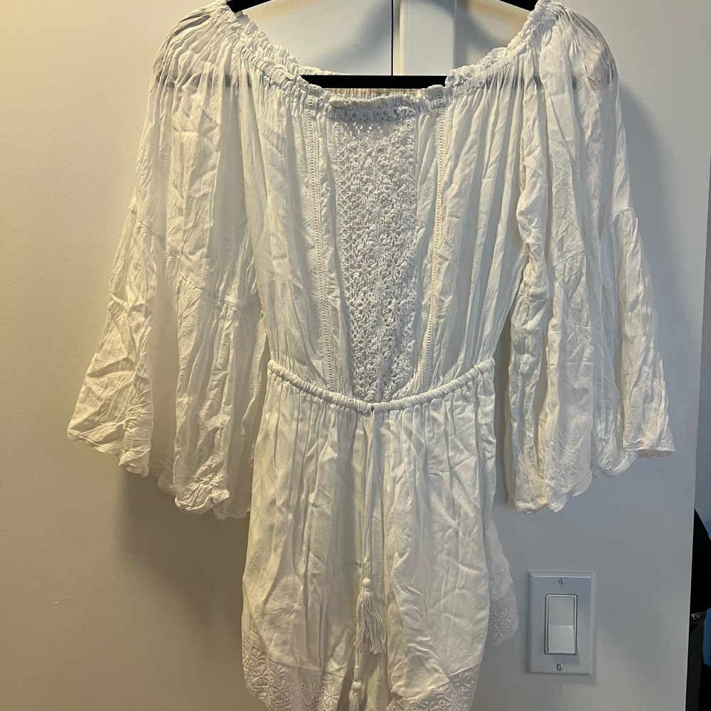 Brand new LCJ design off the shoulder romper in white